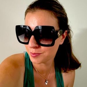 Gucci sunglasses black with gold accent logos GG0053S